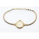 A 9ct gold cased Rotary ladies wristwatch, face marked 'Rotary Swiss Made' with Arabic numerals,