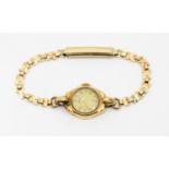 A ladies vintage 9ct gold cased Rotary wristwatch, on later plated strap, total gross weight
