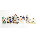 Six mid 19th century Staffordshire figures including Toby jug and animal figures , Condition :
