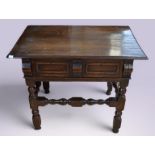 A late 17th / early 18th century Dutch oak lowboy or hall table, with single frieze drawer below