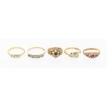 A collection of five stone set 9ct gold rings, including a toi et moi illusion set diamond ring,