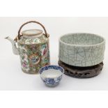 A 20th century Chinese famille verte porcelain tea pot, with woven handle, unmarked; along with a