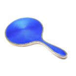 A George V silver and blue guilloche enamel vanity mirror, having a decorative foliate border and