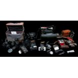A collection of vintage cameras to include a cased Vivitar V335 with lenses, JVC video camera with