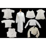 A collection of white wear including early Edwardian cami tops both with straps and short sleeves, 2