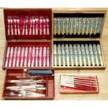 A cased silver-plated and mother of pearl handled knife and fork set, together with a silver-