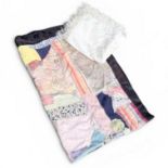 A crazy quilt topper C1930s made up of 20s and 30th fabrics fine wool and cotton backed with patches