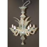 A Murano pale blue and clear six light chandelier and pair of two light wall sconces. Each with