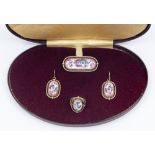 A cased enamel jewellery set, comprising brooch, earrings and ring, possibly 'Finift' (Russian),