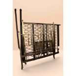 Edwardian brass and cast-iron framed double bed on castors.