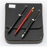 Montblanc- a vintage Slimline Red push-end pen, together with a Hugo Boss fountain pen and ballpoint