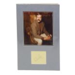 Oliver Reed Autograph on page from autograph book mounted with a full colour picture. Robert