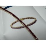 18k GOLD NATURAL RUBY 6.60ct AND DIAMOND TENNIS BRACELET APPROX. 7'' LONG AND APPROX. 21g