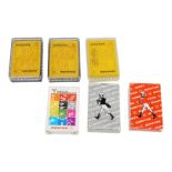 A collection of vintage promotional and commemorative playing card decks, circa 1970-80s