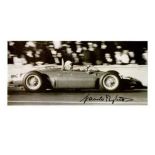 BAGHETTI: Image of Giancarlo Baghetti racing a Ferrari 156. Baghetti signature