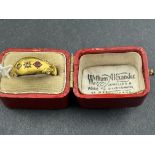 Jewellery: 18ct gold boat-shaped diamond and ruby ring (one ruby missing), scroll decoration