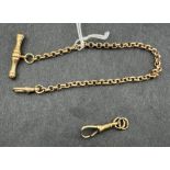 Jewellery: a yellow metal short watch chain with hollow T bar, marked 375 and testing as gold,