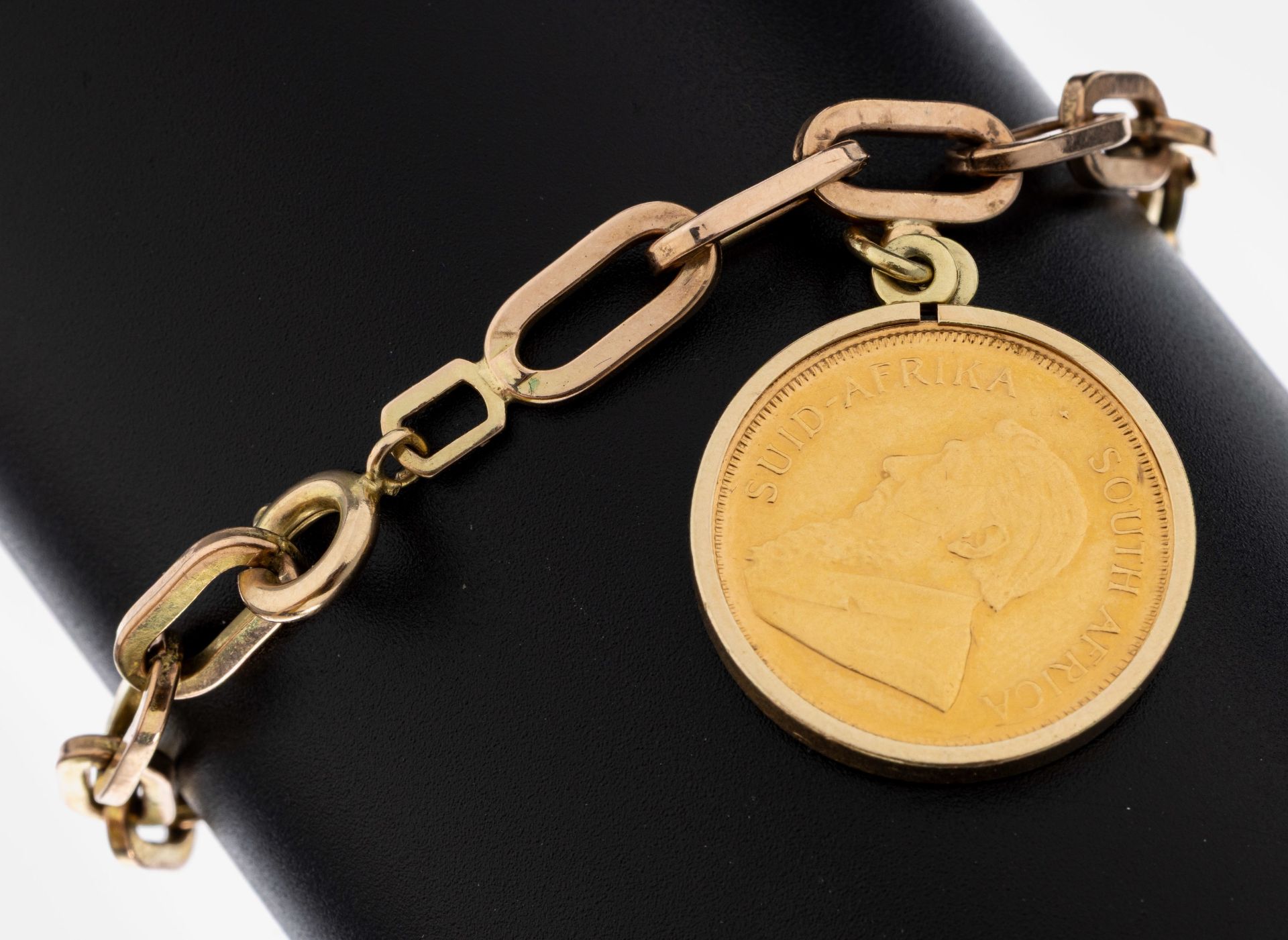 8 kt Gold Münz-Armband, GG 333/000, länglich ovale