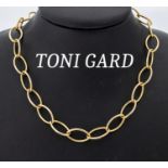 14 kt Gold TONI GARD Collier, GG 585/000, linsenförm.
