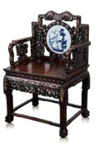 A MOTHER OF PEARL INLAID AND PORCELAIN BACK HARDWOOD CHAIR