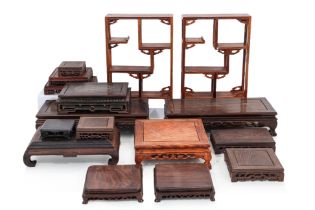 A GROUP OF SQUARE AND RECTANGULAR HARDWOOD STANDS
