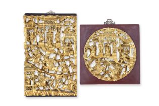 TWO CARVED AND GILT WOOD PANELS
