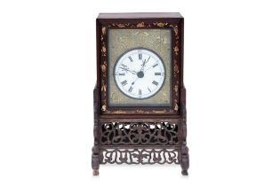 A CHINESE HARDWOOD TABLE CLOCK