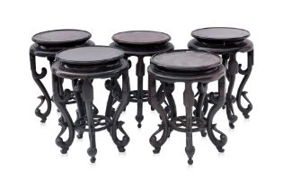 A GROUP OF FIVE HARDWOOD STANDS