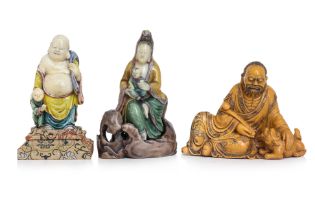 A GROUP OF THREE SOAPSTONE CARVED FIGURES