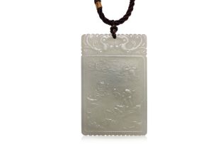 A CARVED JADE PLAQUE PENDANT