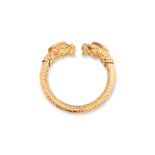 A SOUTH EAST ASIAN WEIGHTED GOLD BANGLE