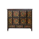 A TIBETAN POLYCHROME PAINTED CABINET