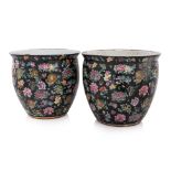 A PAIR OF BLACK GROUND FAMILLE ROSE PORCELAIN JARDINIERES