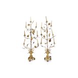 A PAIR OF GILT METAL EIGHT-LIGHT CANDELABRA