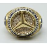 A 14ct gold, enamel and white stone Mercedes Benz design ring, 7.8g, W