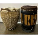 A pair of African animal hide bongo drums