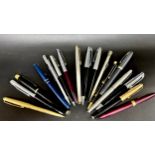 A collection of pens, including Parker and Sheaffer