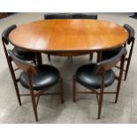 A G-Plan Fresco teak circular extending dining table and six chairs