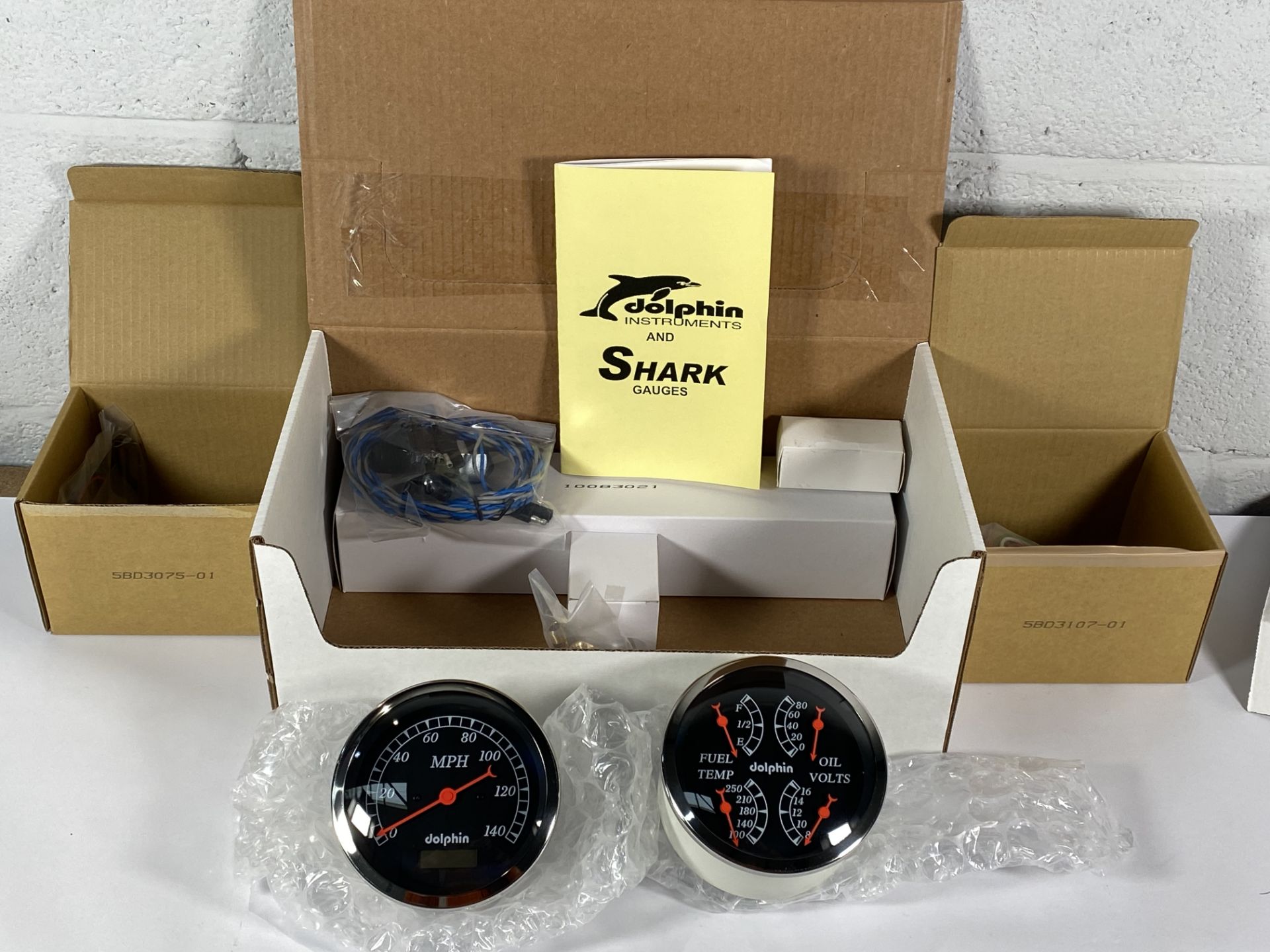 An Dolphin 5" Black Quad set with programmable speedometer.