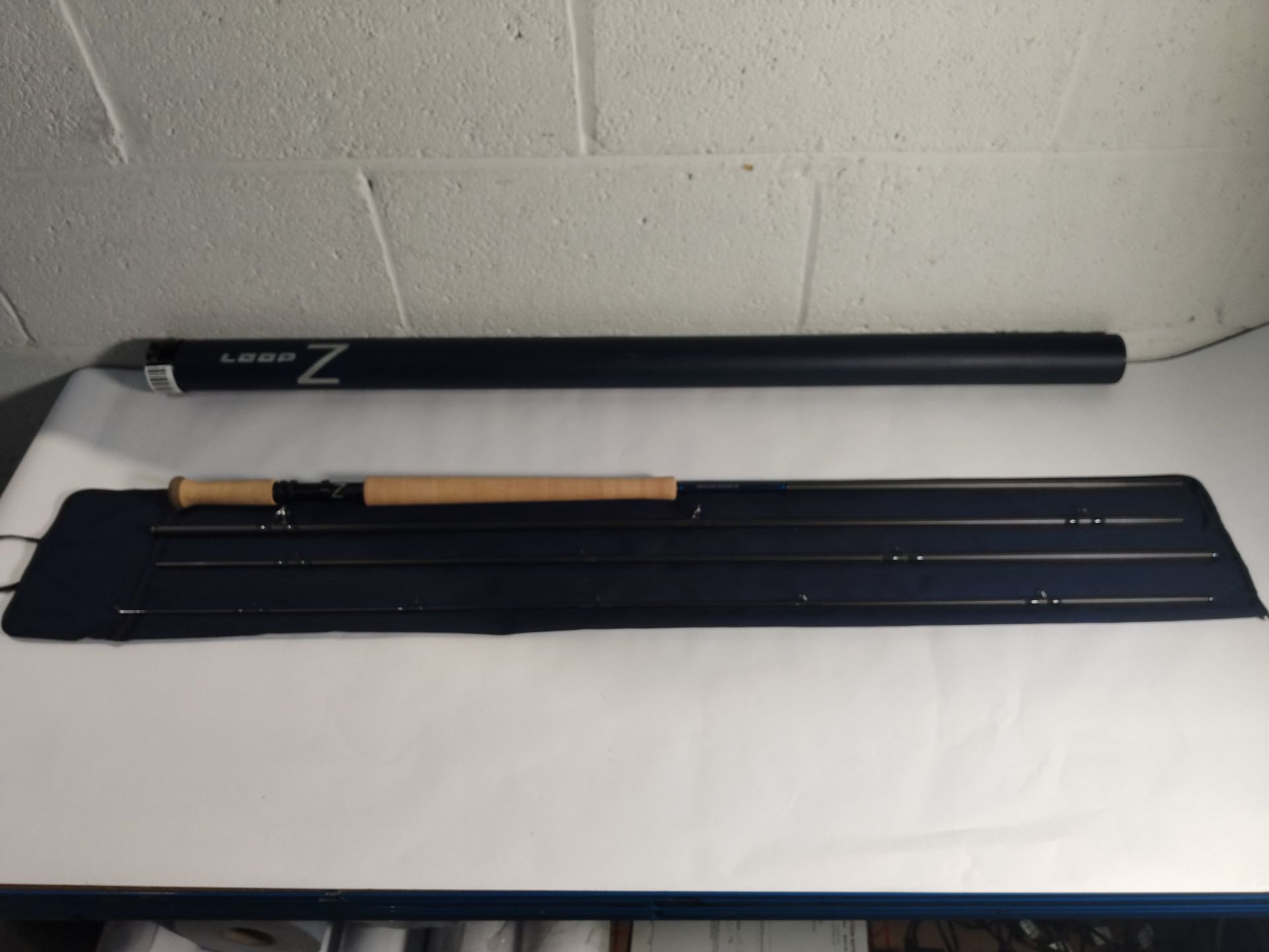 A pre-owned Loop Z1 double hand fly rod 4-piece.