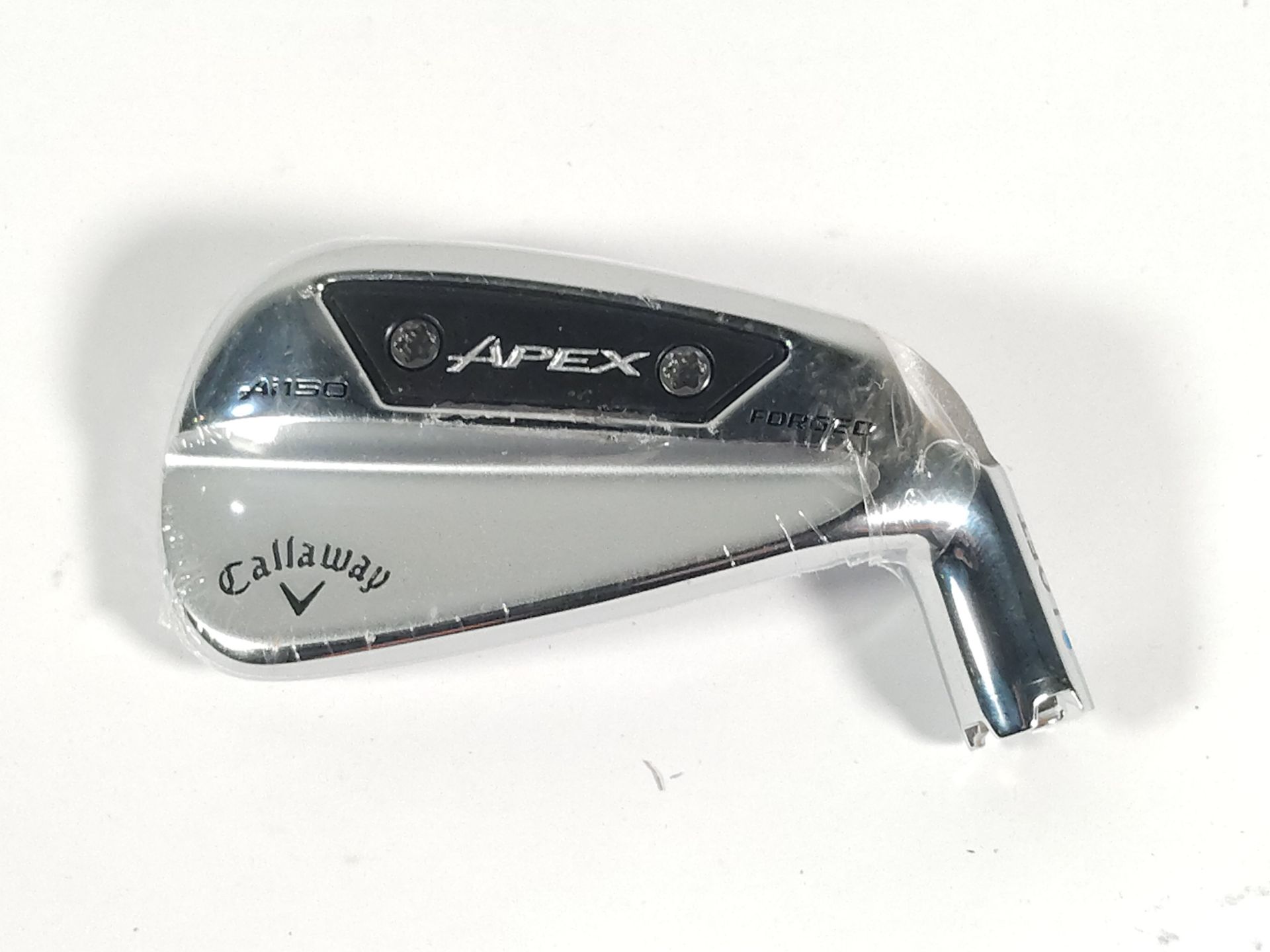 An as new Callaway Apex Ai 150 Forged 7 iron golf club head (Right-handed).