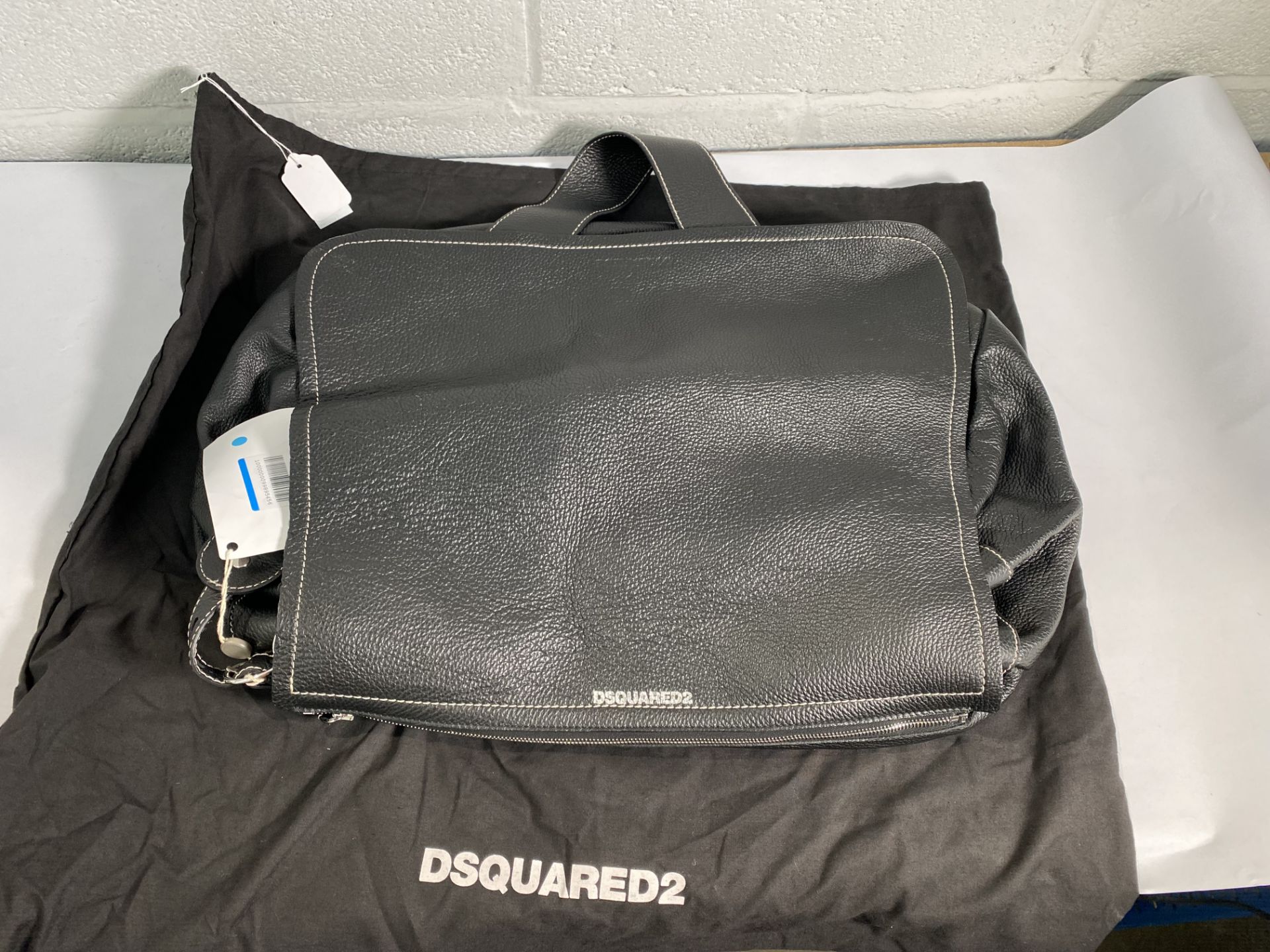 A pre-owned Dsquared2 leather bag with dust bag.