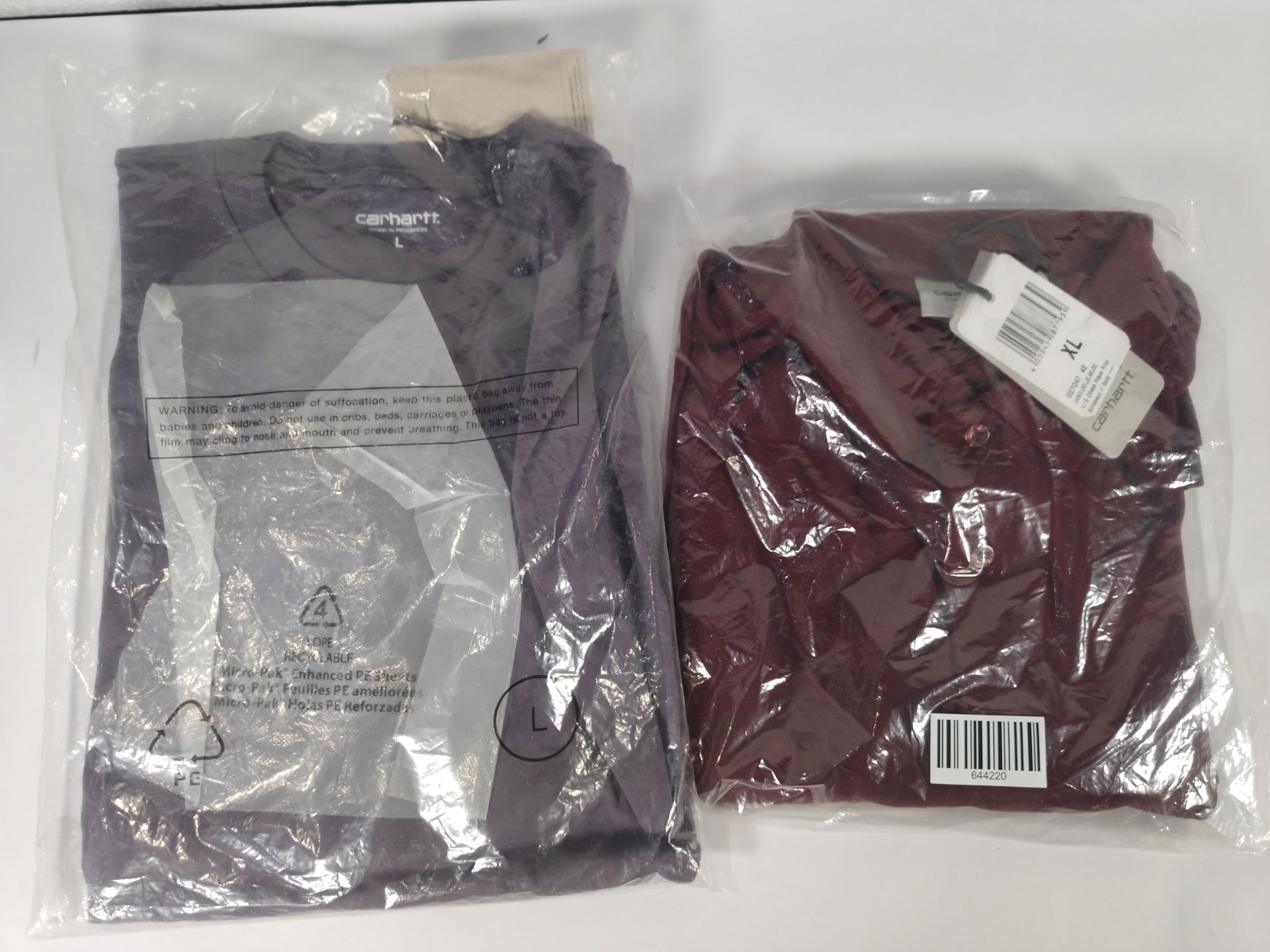 Two as new Carhartt Chase clothing items to include 1x L/S chase t-shirt in provence/gold (Size L) a