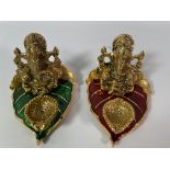 Twenty five as new small metal idols of the Hindu diety Lord Ganesha.