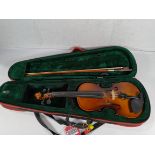 A pre-owned Yamaha student violin with case and bow.