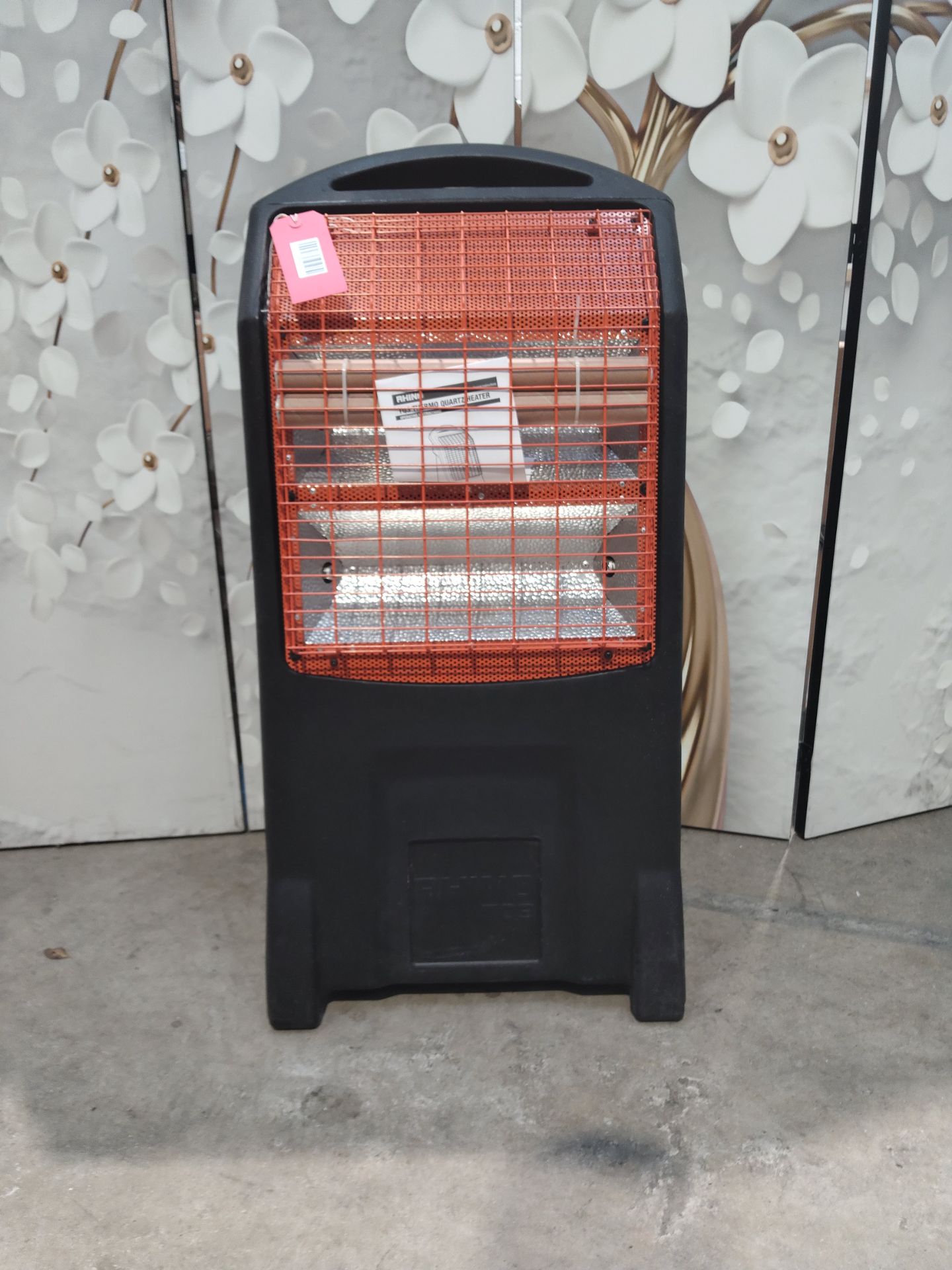 An as new Rhino TQ3 Thermo quartz heater 110V 1.1KW (no box).