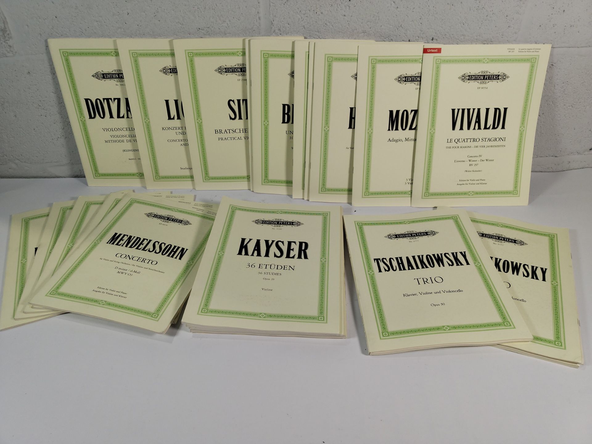 Twenty four assorted as new Edition Peters sheet music books to include composers such as Mendelssoh