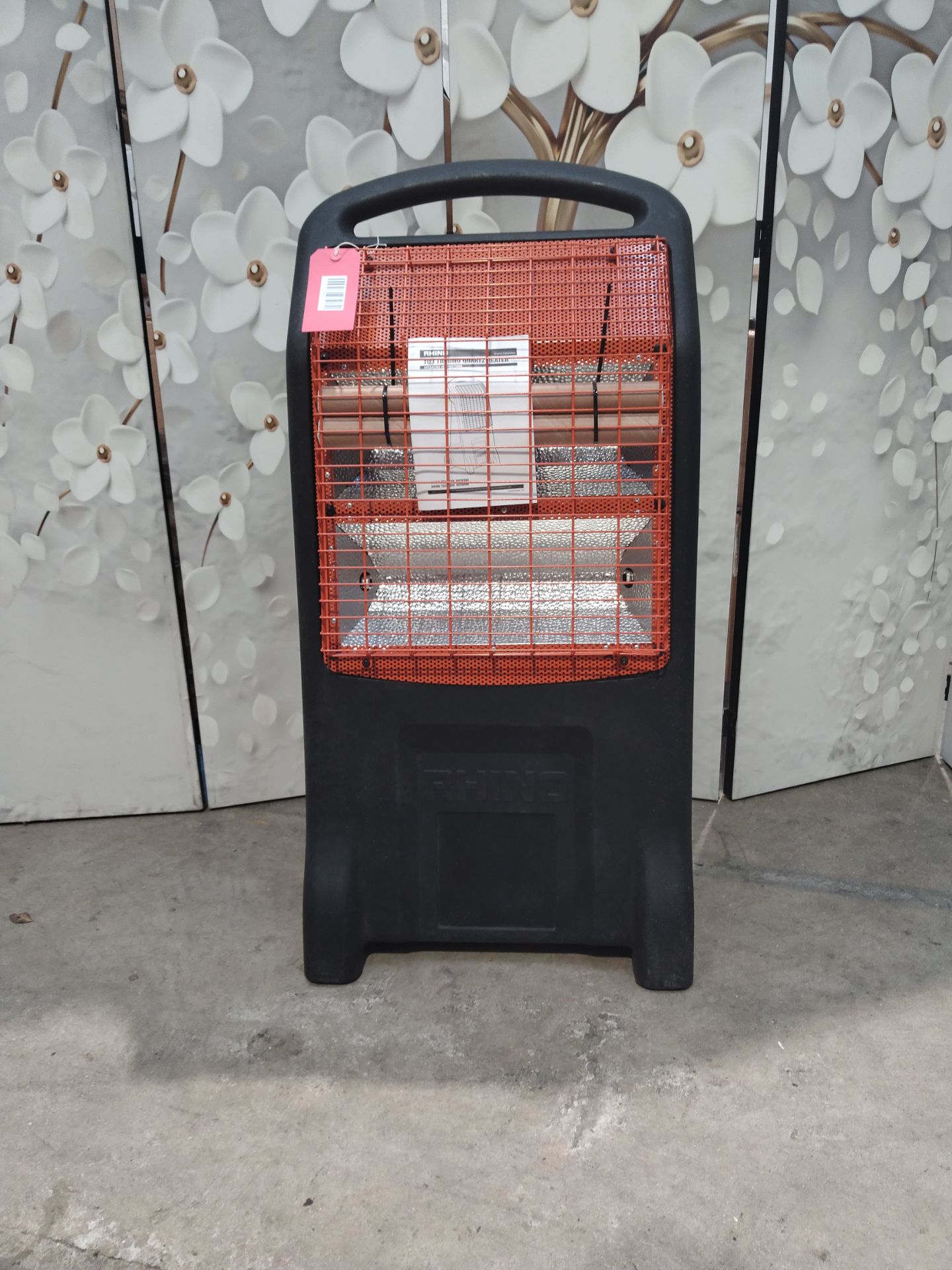 An as new Rhino TQ3 Thermo quartz heater 110V 1.1KW (no box).