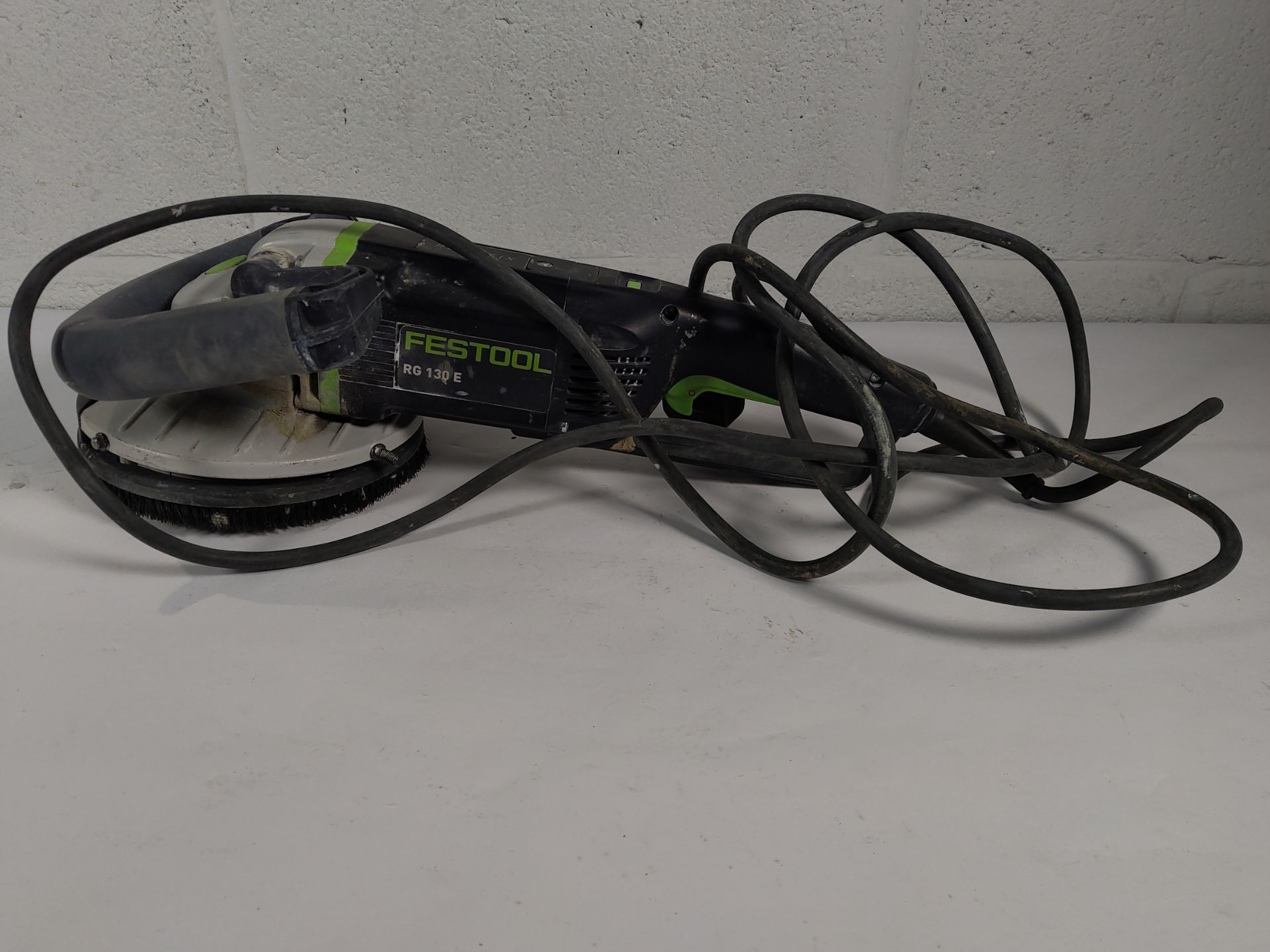 A pre-owned Festool RG130 surface restoration grinder (spares or repairs).