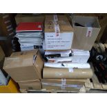 A pallet of stationary and related items, including printer paper, envelopes. tills and more.